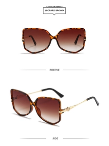 Detail of leopard print frames with brown gradient lenses and gold metal temples
