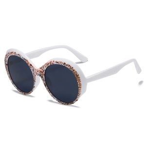 Lunettes de soleil rondes avec monture blanche et motif d'éclaboussures orange