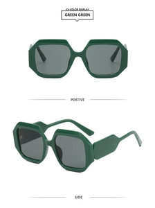 Detail view of bold green hexagonal sunglasses with dark grey lenses and chunky temples