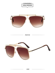 Detail view of gold brown pilot sunglasses featuring dual beam frames and gradient lenses
