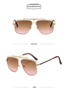 Detail view of gold aviator sunglasses with brown pink gradient lenses and side profile