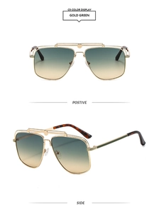 Detail view of gold aviator sunglasses with green gradient lenses and tortoise ear tips