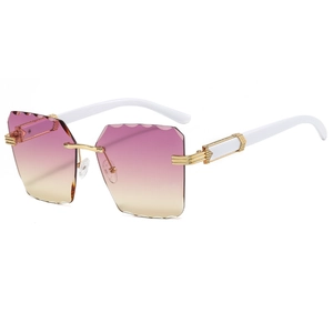 Modern rimless square sunglasses with pink gradient lenses and gold carved metal hinges