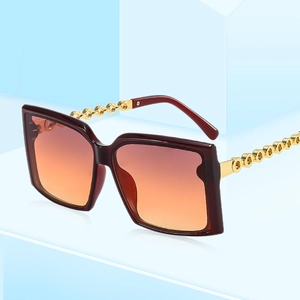 Square fashion sunglasses with gradient lenses and golden metal chain temples
