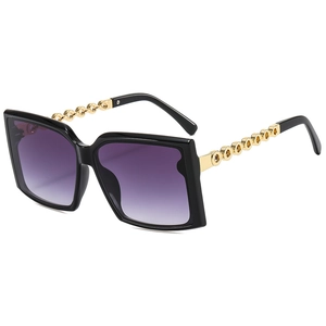 Stylish square frame sunglasses with purple gradient lenses and gold chain temples