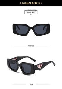 Detail of square black frame sunglasses with grey lenses and marble temple accents