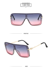 Detalle de gafas de sol cuadradas de metal con lentes de degradado rosa púrpura