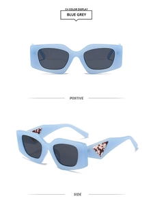 Detail view of blue grey square rectangle sunglasses with tortoiseshell triangle accents