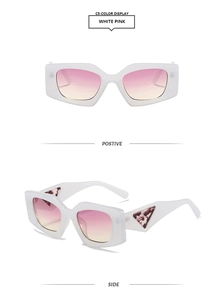 Detail view of white thick frame sunglasses with pink-yellow gradient lenses and marble inlay
