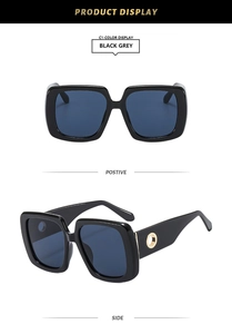 Detailed front and side view of square oversized sunglasses with gold temple accents
