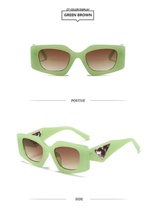 Detail of square thick frame sunglasses in green with brown gradient lenses and triangle motif