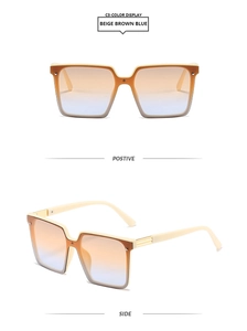 Detail view of beige square frame sunglasses with gold accents and gradient lenses