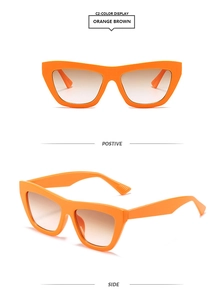 Detail view of orange cat-eye sunglasses with gradient brown lenses from front and side