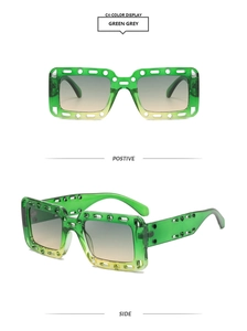 Green candy-colored square sunglasses with hollowed frame and grey gradient lenses