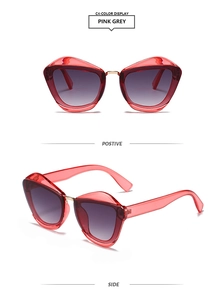 Pink cat-eye sunglasses with grey gradient lenses and gold bridge detail, front and side views