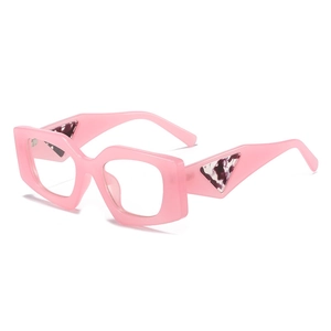 Pink square thick frame fashion sunglasses with marble triangle detail shown at a 45-degree angle