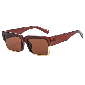 Fashionable square sunglasses with brown frame and gold metal trim on white background