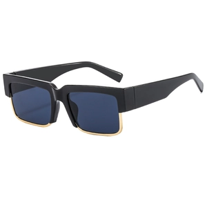 Modern rectangular sunglasses with thick black frame and unique gold metal trim detail
