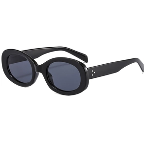 Retro oval sunglasses with glossy black frames and deep grey lenses for a vintage fashion style
