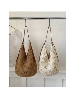 Detailed close-up of bohemian sunflower crochet bag showing handwoven geometric patterns