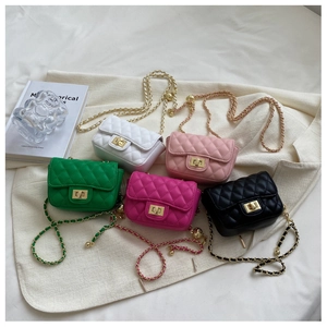Detail of five mini quilted crossbody bags with gold chain straps and metal locks