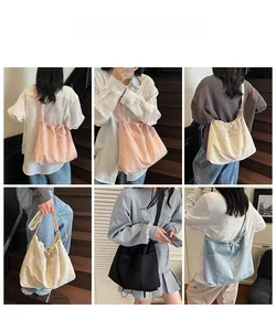 Detail showing various colors of large-capacity waffle texture nylon drawstring bucket bags
