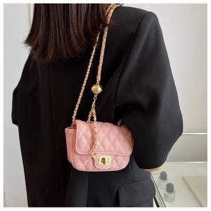 Pink quilted mini chain crossbody bag with golden lucky ball detail and metal lock