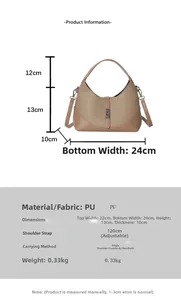 Detailed view of bicolor handbag dimensions 24x13x10cm with adjustable 120cm shoulder strap