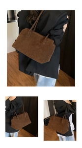 Close-up of brown suede tote bag featuring matte leather texture and slim shoulder straps