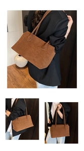 Three-way view of brown suede tote bag with geometric design for office commuting