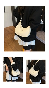 Detailed views of the white litchi pattern leather underarm bag with COIH 2DN logo
