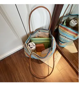 Top view of striped woven tote bag showing large capacity for tablet and daily items