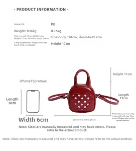 Detailed size comparison of red heart polka dot mini bag next to a smartphone