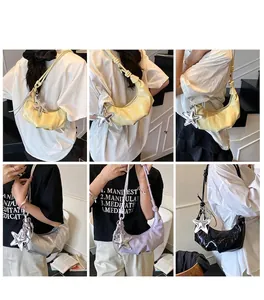 Vues détaillées de sacs demi-lune avec breloques étoiles en beige, argent, violet et noir