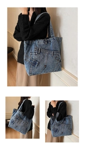 Detail of vintage denim tote bag showing reconstructed jeans pocket and stitching design
