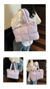 Detail of lavender quilted puffer tote bag showing soft padded texture and carry handles