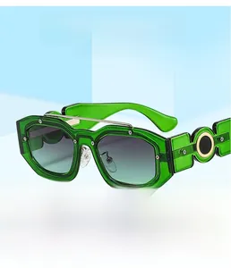 Detail of green hexagonal sunglasses with a metal bar and wide temples on a blue stand