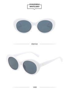 Close-up of white oval thick-framed sunglasses with grey lenses from multiple angles