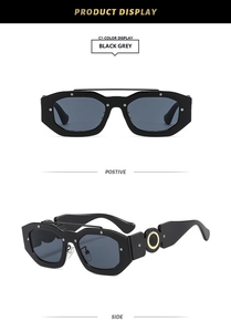 Detail of punk square sunglasses with wide temples and golden ring decorative elements