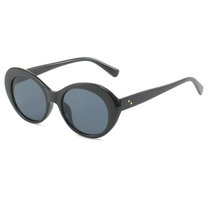 Retro oval sunglasses with thick black frames and iconic gold rivet detail on front