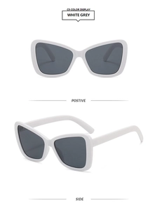 Detailansicht der weißen Schmetterlings-Sonnenbrille mit dunkelgrauen Gläsern von vorne