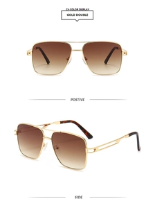 Detail of gold double bridge aviator sunglasses with brown gradient lenses and tortoise tips