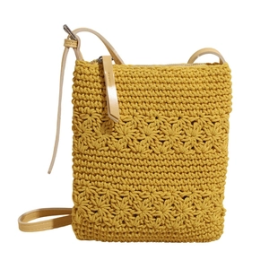 Handmade yellow crochet crossbody bag with floral pattern and leather shoulder strap