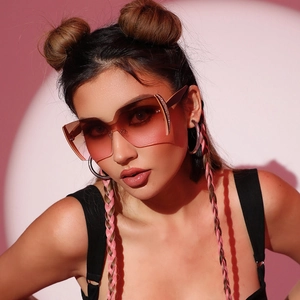 Fashionable oversized butterfly rimless sunglasses with pink gradient lenses and glitter detail