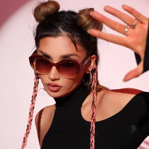 Fashionable oversized polygon cat-eye sunglasses with brown gradient lenses and tortoise frame
