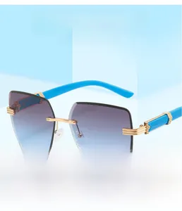 Detail view of rimless square sunglasses with blue-purple gradient lenses and metal temples