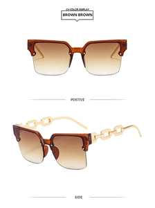 Détails macro de lunettes demi-cerclées avec chaîne dorée et verres dégradés marron