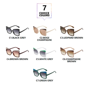 Matrix display of seven stylish oversized cat-eye sunglasses in various gradient colors
