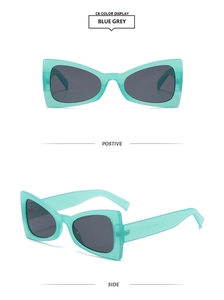 Front and side view of mint green cat-eye sunglasses with dark grey lenses
