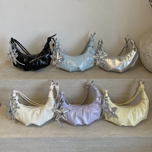 Modern croissant-style handbags in six vibrant colors with silver star charm accents